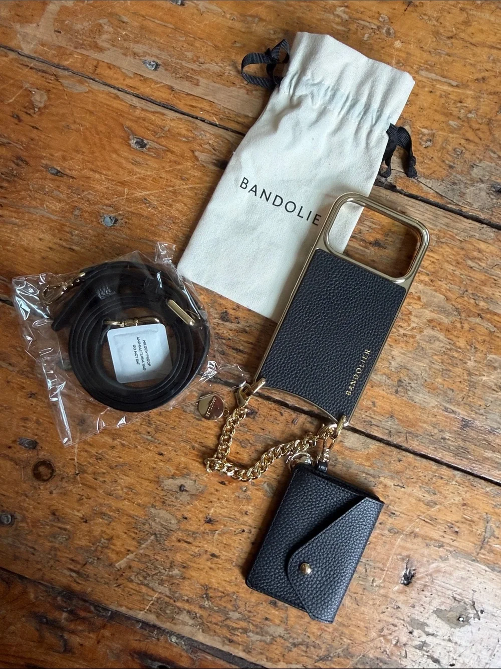 Bandolier Remi Black/Gold Leather iPhone 17 pro Crossbody with Charm Wristlet - Picture 3 of 3